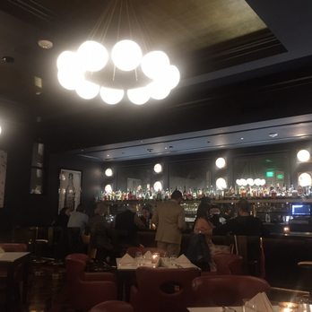 Blackbird - A picture of inside Blackbird looking towards their excellently stocked bar. - New American Near Me - Santa Barbara, California
