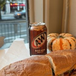 Banh me chicken sandwich and a root beer soda