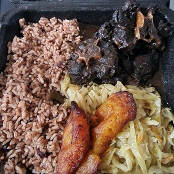 Da Reggae Cafe - Oxtails, rice and peas w/ cabbage. - Caribbean Near Me - Greensboro, North Carolina