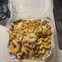 Disappointing Cajun Alfredo Pasta with overcooked shrimp