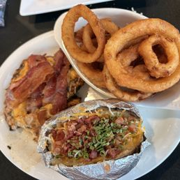 Big Dave's Chicken with onion rings and loaded baked potato Big Dave's Chicken with onion rings and loaded baked potato