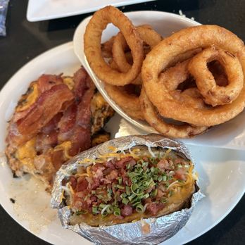 Side Porch Steak House - Big Dave's Chicken with onion rings and loaded baked potato - Steakhouses Near Me - Bartlett, Tennessee Side Porch Steak House - Big Dave's Chicken with onion rings and loaded baked potato - Steakhouses Near Me - Bartlett, Tennessee