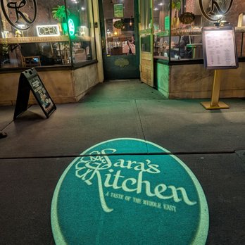 Sara's Kitchen - Restaurant front with sidewalk art - Middle Eastern Near Me - Saratoga Springs, New York Sara's Kitchen - Restaurant front with sidewalk art - Middle Eastern Near Me - Saratoga Springs, New York