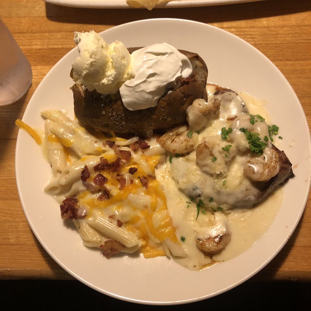 Applebee's Grill + Bar - Sirloin steak and shrimp with a baked potatoe and macaroni and cheese on the side. - American Near Me - Biloxi, Mississippi Applebee's Grill + Bar - Sirloin steak and shrimp with a baked potatoe and macaroni and cheese on the side. - American Near Me - Biloxi, Mississippi