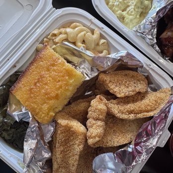 Doll's Kitchen - Spicy fried fish combo W/ cornbread, mac and cheese and mixed greens - Soul Food Near Me - Fresno, California Doll's Kitchen - Spicy fried fish combo W/ cornbread, mac and cheese and mixed greens - Soul Food Near Me - Fresno, California