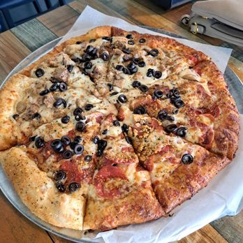 Southern Roots Brewing - Custom pie half sausage pulled pork/half pepperoni and mushroom with olives all over. - Breweries Near Me - Killeen, Texas Southern Roots Brewing - Custom pie half sausage pulled pork/half pepperoni and mushroom with olives all over. - Breweries Near Me - Killeen, Texas