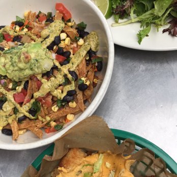 Kayak Kafe - Top right is the black bean, spinach, & mushroom tacos. Middle it the vegan taco salad. Bottom is the vegan tater tot nachos - Sandwiches Near Me - Savannah, Georgia Kayak Kafe - Top right is the black bean, spinach, & mushroom tacos. Middle it the vegan taco salad. Bottom is the vegan tater tot nachos - Sandwiches Near Me - Savannah, Georgia