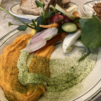 Grounded Table - Fresh and pickled veggie plate with some delicious sourdough peeking out from behind! Yummmmmmm! - New American Near Me - McMinnville, Oregon