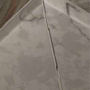 TILES UP - Tile loose , grout cracking - Kitchen & Bath Near Me - Melville, New York TILES UP - Tile loose , grout cracking - Kitchen & Bath Near Me - Melville, New York