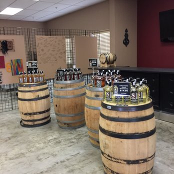 8 Feathers Distillery - barrels of liquor on display - Wineries Near Me - Boise, Idaho