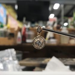 Bench Jeweler - Nicely bezel set pendant ready for a surprise birthday present.