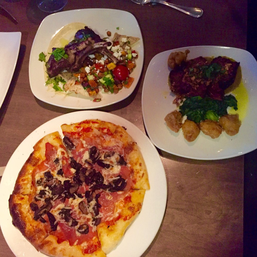 Crazyweed Kitchen - Clockwise from top: Alberta sun gold lamb rack chops, Rendang short ribs, Oscar Wilde pizza - Asian Fusion Near Me - Canmore, Alberta