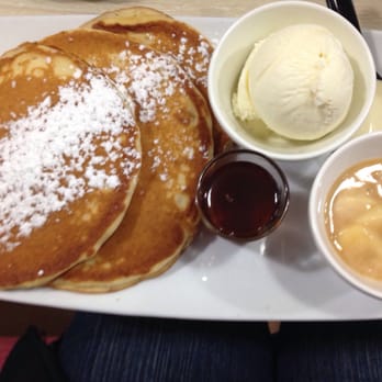 Bayaroma - Pancakes with maple syrup, candied banana, ice cream and cream. Yummy - Restaurants Near Me - Torquay, QLD