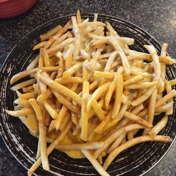 Sgt. Pepper's Cafe - If it wasn't for the thin crispy fries, this would have easily been the worst ponyshoe I've ever had in SPI. - Breakfast & Brunch Near Me - Springfield, Illinois