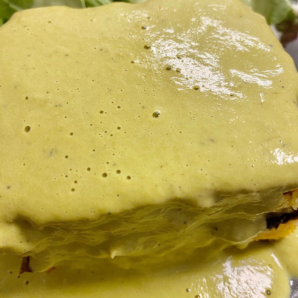 Over the top flavor of chicken and poblano peppers baked into the 2" thick cornbread with a savory poblano gravy poured over the top. Over the top flavor of chicken and poblano peppers baked into the 2" thick cornbread with a savory poblano gravy poured over the top.