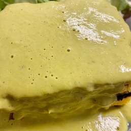 Over the top flavor of chicken and poblano peppers baked into the 2" thick cornbread with a savory poblano gravy poured over the top. Over the top flavor of chicken and poblano peppers baked into the 2" thick cornbread with a savory poblano gravy poured over the top.