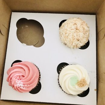 Love At First Bite - Pink strawberry, green white is pistachio and the left upper corner is coconut cupcake. Yummy - Bakeries Near Me - Berkeley, California