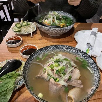 District Saigon - Vegan Pho(top) Wood and Herb Smoked Brisket Pho(bottom) - Vietnamese Near Me - Astoria, New York District Saigon - Vegan Pho(top) Wood and Herb Smoked Brisket Pho(bottom) - Vietnamese Near Me - Astoria, New York