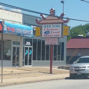 Man Hing - a car parked in front of a business - Chinese Near Me Man Hing - a car parked in front of a business - Chinese Near Me