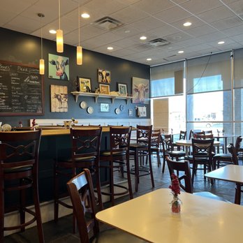 Bones' Burgers - mpty tables and chairs in a restaurant - Burgers Near Me - Montgomery, Ohio Bones' Burgers - mpty tables and chairs in a restaurant - Burgers Near Me - Montgomery, Ohio