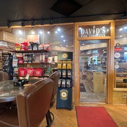 David's Fine Tobaccos - Walk in humidor and tables and chairs.