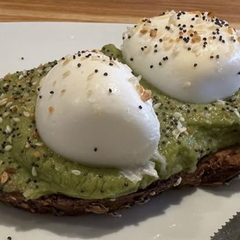 Broken Yolk Cafe - Avocado on toast with poached eggs - Breakfast & Brunch Near Me - McKinney, Texas