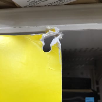 Michaels - Here is the broken sign which was placed back in place temporarily. While reaching for my item it broke loose and hit my nose - Arts & Crafts Near Me - Brea, California
