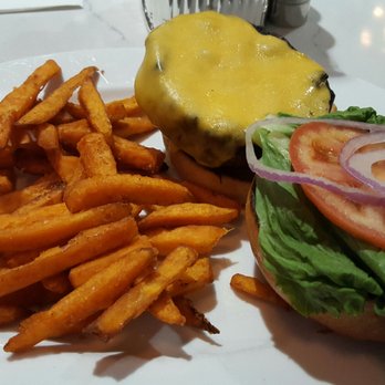 Cat Cora's Kitchen - This is what a $15.50 burger looks like. - New American Near Me - Atlanta, Georgia Cat Cora's Kitchen - This is what a $15.50 burger looks like. - New American Near Me - Atlanta, Georgia