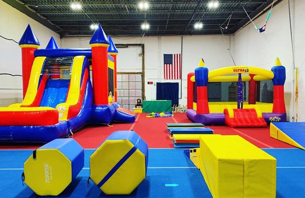 Birthday Parties - International Elite Birthday Parties offer exclusive access to our gym and party room for a fun-filled celebration! Enjoy free play and directed activities, including a deluxe bounce house, standard bounce house, trampoline track, rope swing, obstacle course, and optional parachute games. Our party room comes with tables and chairs; you just bring the food, decorations, and supplies.
Pricing: $350 for 1.5 hours for up to 15 children (including the birthday child). $10 for each additional child, up to 20 total. Full payment is required at registration. Date changes can be made due to illness or other reasons, subject to availability. A $100 non-refundable deposit applies for cancellations.
Arrive 15 minutes early for setup, and let us handle the cleanup! Birthday Parties - International Elite Birthday Parties offer exclusive access to our gym and party room for a fun-filled celebration! Enjoy free play and directed activities, including a deluxe bounce house, standard bounce house, trampoline track, rope swing, obstacle course, and optional parachute games. Our party room comes with tables and chairs; you just bring the food, decorations, and supplies.
Pricing: $350 for 1.5 hours for up to 15 children (including the birthday child). $10 for each additional child, up to 20 total. Full payment is required at registration. Date changes can be made due to illness or other reasons, subject to availability. A $100 non-refundable deposit applies for cancellations.
Arrive 15 minutes early for setup, and let us handle the cleanup!