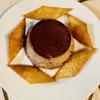 Figaro's Mexican Grill - Flan with sugared cinnamon chips. - Mexican Near Me - Tulare, California Figaro's Mexican Grill - Flan with sugared cinnamon chips. - Mexican Near Me - Tulare, California
