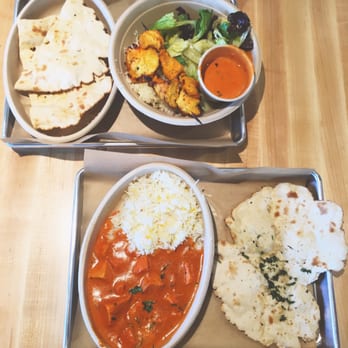 Tikka Shack Indian Grub - Top is the Chicken Kabob with rice, a side salad and naan! Bottom is the Chicken Masala and rice with garlic naan! - Indian Near Me - Lubbock, Texas