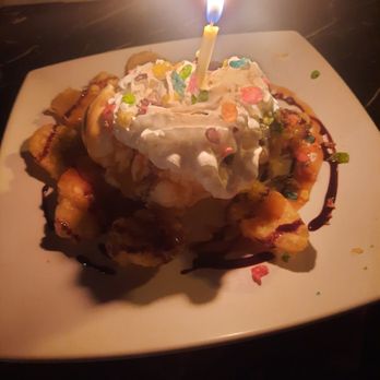 Sato Sushi - Tempura banana, vanilla ice cream, whipped cream, fruity pebbles, caramel and chocolate syrup. - Sushi Bars Near Me - Lancaster, California Sato Sushi - Tempura banana, vanilla ice cream, whipped cream, fruity pebbles, caramel and chocolate syrup. - Sushi Bars Near Me - Lancaster, California