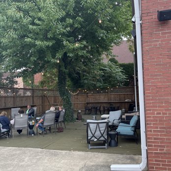 Jacksons Cigar And spirits - Outside rockers tables. - Cigar Bars Near Me - Mishawaka, Indiana