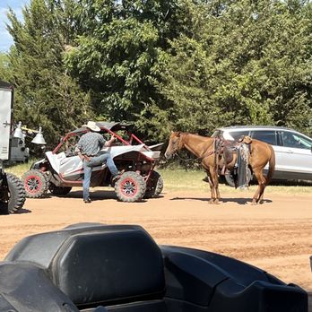 Soggy Bottom Trails, Pub & Camping - Cowboy talking to a guy in a sxs - Campgrounds Near Me - Wanette, Oklahoma