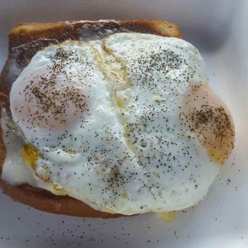 The Belted Goat - The ham and cheese cahella with bacon and fried eggs. - Coffee & Tea Near Me - Pittsboro, North Carolina The Belted Goat - The ham and cheese cahella with bacon and fried eggs. - Coffee & Tea Near Me - Pittsboro, North Carolina