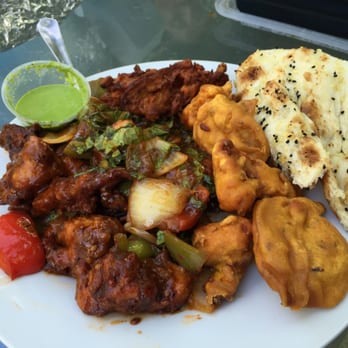 Feast of Dilli - Chicken 65, garlic naan, and some apps to go! Delicious! - Indian Near Me - Toronto, Ontario Feast of Dilli - Chicken 65, garlic naan, and some apps to go! Delicious! - Indian Near Me - Toronto, Ontario