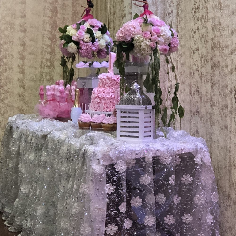 Gumri Shish Kabab - a table with pink and white flowers - Middle Eastern Near Me - Valley Glen, California