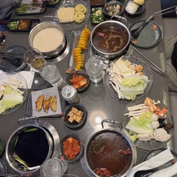 Square Shabu - Table full of appetizers. The tornado potato was extra fun and delicious! - Hot Pot Near Me - Spring Valley, Nevada Square Shabu - Table full of appetizers. The tornado potato was extra fun and delicious! - Hot Pot Near Me - Spring Valley, Nevada