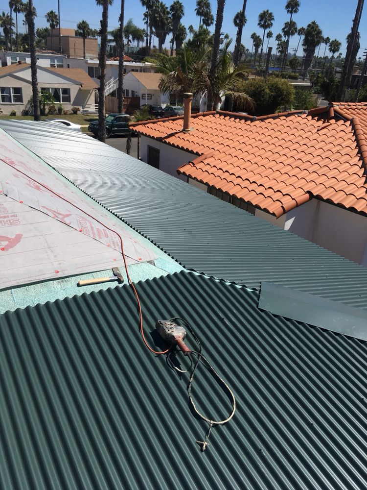 Slide of Vulcan Roofing Co