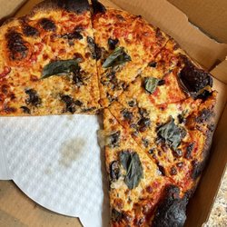 Problem Child Pizza - Problem Child Pizza. Burnt with skimpy toppings.