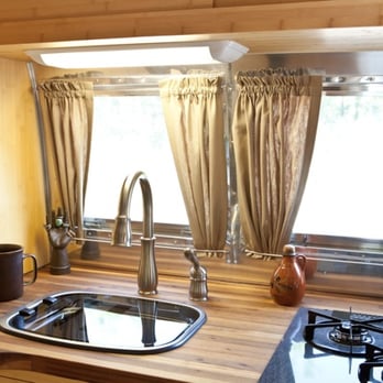 New Prairie Construction - Vintage Airstream kitchenette with reclaimed redwood countertops, Urbana, IL - General Contractors Near Me - Urbana, Illinois New Prairie Construction - Vintage Airstream kitchenette with reclaimed redwood countertops, Urbana, IL - General Contractors Near Me - Urbana, Illinois