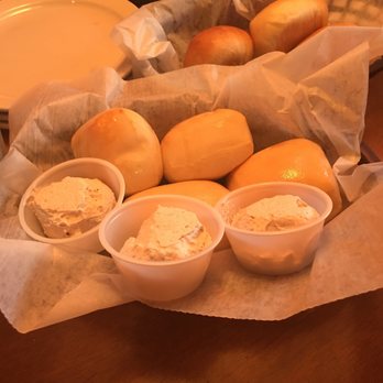 Texas Roadhouse - Delicious evil rolls with cinnamon butter - Steakhouses Near Me - Warren, Ohio