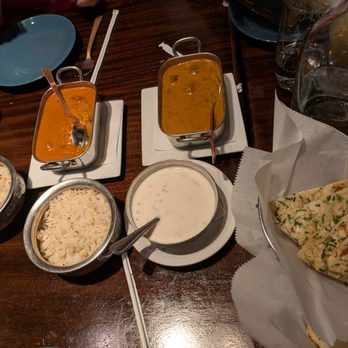 Viceroy - Two curries, yogurt sauce, and garlic naan - Indian Near Me - Durham, North Carolina