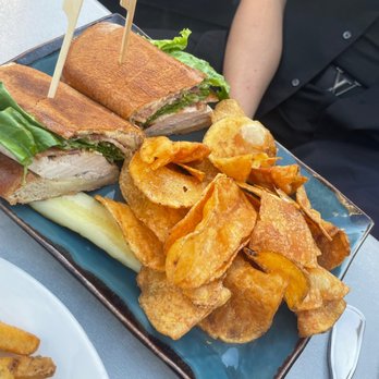 Frolik Kitchen + Cocktails - Pesto Chicken Sandwich with house made potato chips - New American Near Me - Seattle, Washington
