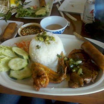 New Saigon - Rice with grilled beef, plus chicken and a egg roll. - Vietnamese Near Me - Bakersfield, California New Saigon - Rice with grilled beef, plus chicken and a egg roll. - Vietnamese Near Me - Bakersfield, California