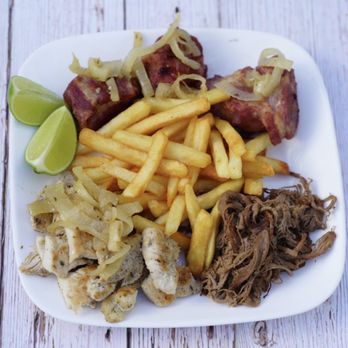 Havanastation Cafe - An Exclusive combination of Havanastation Meats(Chicken,Shredded Beef, Fried Pork Chunck) with our Famous Cuban Seasoning , this dish is per - Food Trucks Near Me - Homestead, Florida