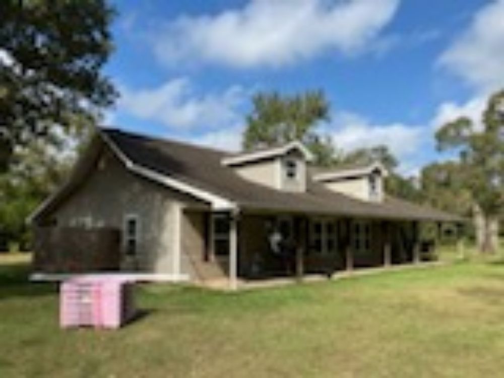 Slide of Estate Roofing