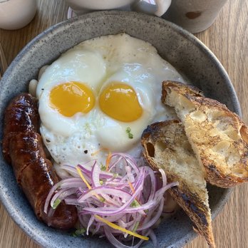Llama Inn - Sausage with fried egg, toast and Charred Summer Beans, Sourdough - Peruvian Near Me - Brooklyn, New York Llama Inn - Sausage with fried egg, toast and Charred Summer Beans, Sourdough - Peruvian Near Me - Brooklyn, New York
