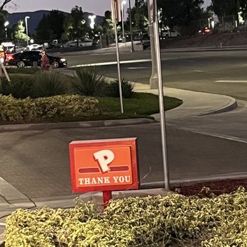 Popeyes Louisiana Kitchen - Signage at end of driveway lane - Fast Food Near Me - Colton, California Popeyes Louisiana Kitchen - Signage at end of driveway lane - Fast Food Near Me - Colton, California