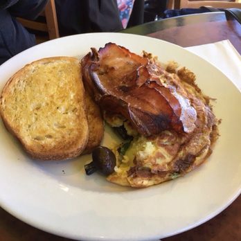 Leura Gourmet - Omelette, with sour dough toast and bacon. - Cafes Near Me - Leura, NSW Leura Gourmet - Omelette, with sour dough toast and bacon. - Cafes Near Me - Leura, NSW